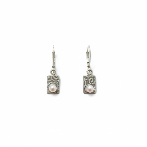 Boucles d'oreilles vagues et perles roses